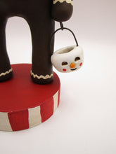 Christmas gingerbread man with snowman bucket