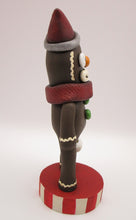 Christmas gingerbread man with snowman bucket