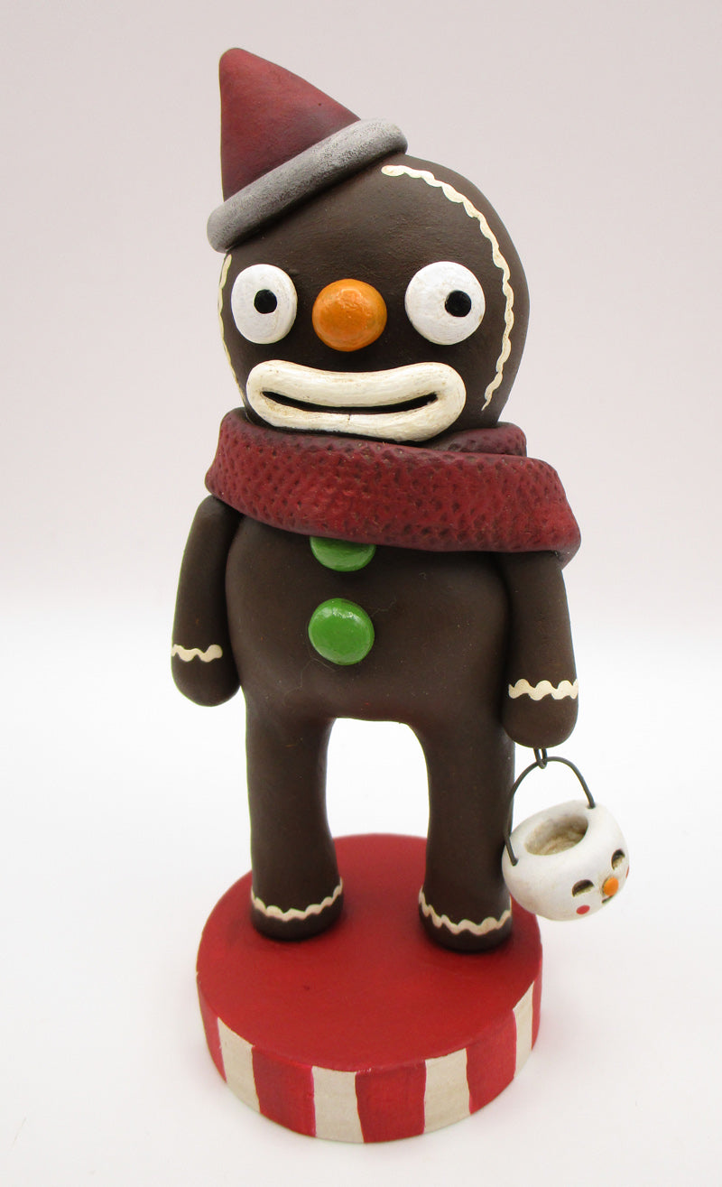 Christmas gingerbread man with snowman bucket