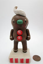 Christmas gingerbread man with frosting top hair