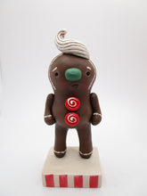 Christmas gingerbread man with frosting top hair