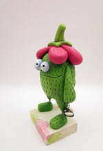 Spring folk art green monster with big flower top