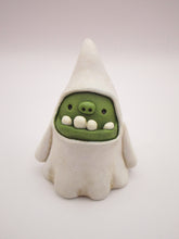 Halloween folk art green monster ghost with wacky teeth