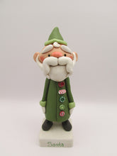 Christmas folk art Santa Claus with long buttoned up jacket