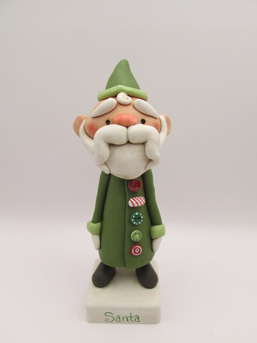Christmas folk art Santa Claus with long buttoned up jacket