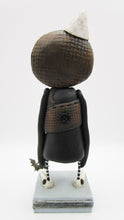 Halloween folk art "gunny sack" texture with lots of buttons and bat charm