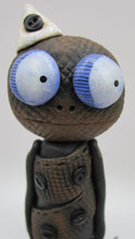 Halloween folk art "gunny sack" texture with lots of buttons and bat charm