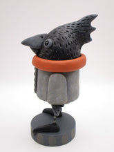 Halloween folk art black bird in jacket with scarf