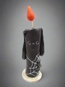 Halloween folk art black candle with spider