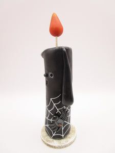 Halloween folk art black candle with spider