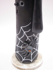 Halloween folk art black candle with spider