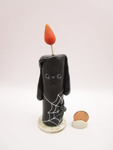 Halloween folk art black candle with spider