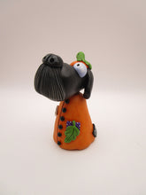 Halloween folk art Dog wearing a pumpkin "patch" costume
