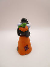 Halloween folk art Dog wearing a pumpkin "patch" costume