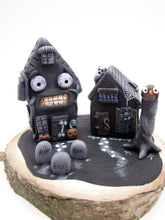 Halloween spooky scene with spooky houses on wood