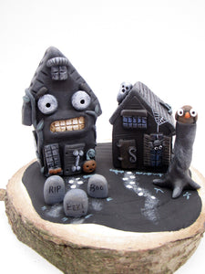 Halloween spooky scene with spooky houses on wood