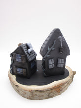 Halloween spooky scene with spooky houses on wood