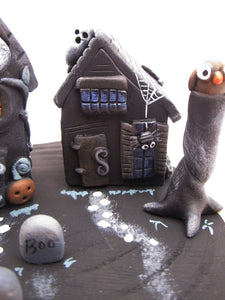 Halloween spooky scene with spooky houses on wood