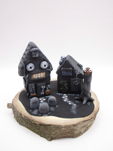 Halloween spooky scene with spooky houses on wood