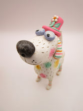 Summer folk art dog with pastel spots and silly floral hat