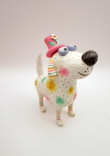 Summer folk art dog with pastel spots and silly floral hat