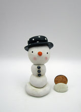 Christmas folk art little snowman with black polka dotted hat