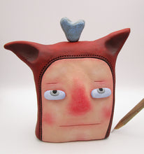 Man with fine crackle light teal heart on head misc love YUANFEN read