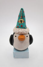 Christmas folk art penguin on ice cube