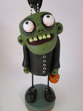 Halloween "Igor" monster with glow in the dark creepy teeth