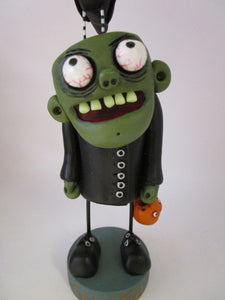 Halloween "Igor" monster with glow in the dark creepy teeth