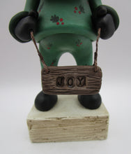 Christmas folk art Santa "JOY" holly suit