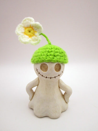 Halloween folk art ghost with knitted flower hat