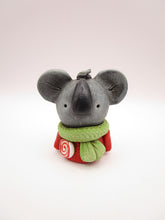 Christmas folk art little koala bear with lollipop