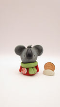 Christmas folk art little koala bear with lollipop