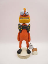 Halloween folk art candy corn man with spooky ghost charm