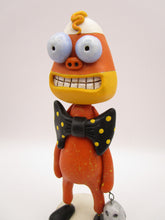 Halloween folk art candy corn man with spooky ghost charm