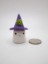 Small Halloween ghost with witch hat and 31