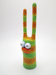 Monster bunny lime and orange with lots of dots