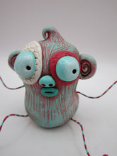Monster folk art dark dark pink and teal monster with bendable arms and legs