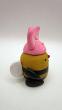 Easter folk art chubby bee wearing bunny hat