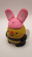 Easter folk art chubby bee wearing bunny hat
