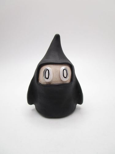 Halloween folk art little black ghost with empty eyes