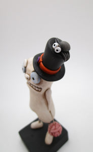 Little Halloween Bone chilling man with Halloween hat and brain