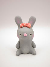 Spring folk art or Valentine folk art sitting grey bunny with bow