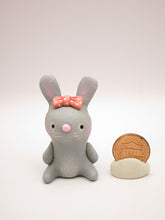 Spring folk art or Valentine folk art sitting grey bunny with bow