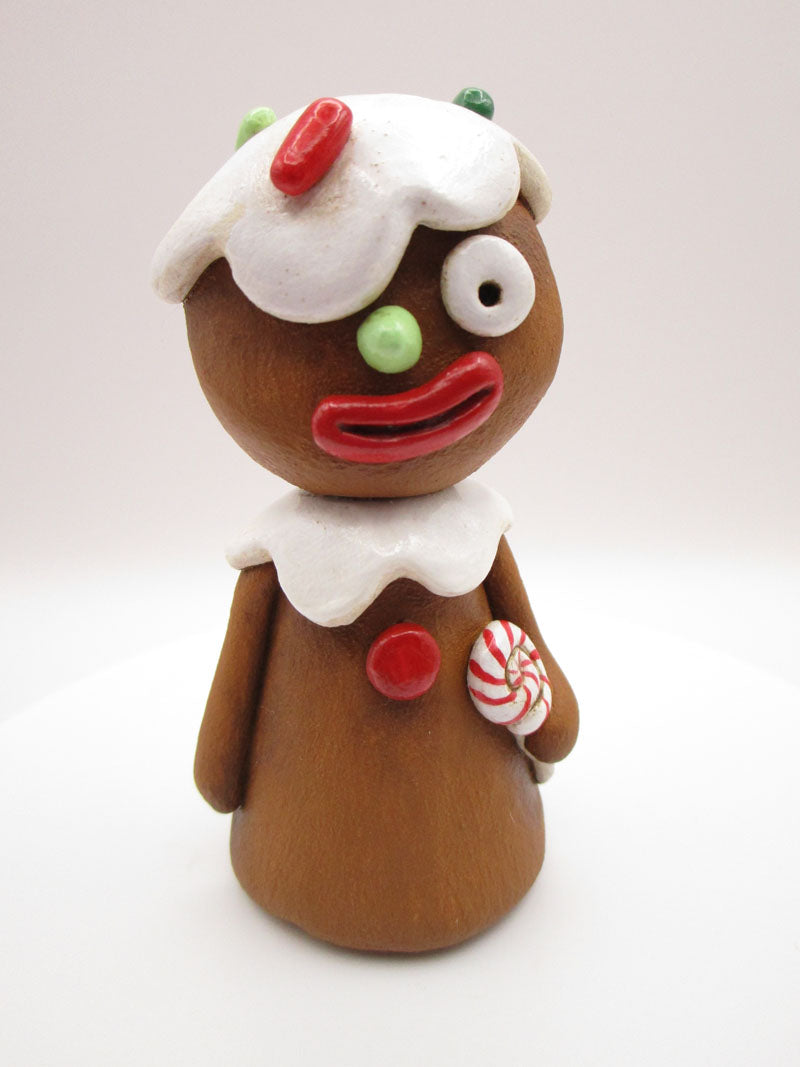 Christmas gingerbread man with lollipop – pumpkinseeds folk art by