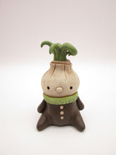 Wacky character spring folk art little sitting onion man with curly top