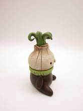 Wacky character spring folk art little sitting onion man with curly top