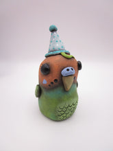 Sitting parakeet with party hat misc art