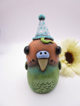 Sitting parakeet with party hat misc art